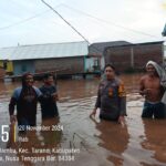 Banjir Melanda Desa Labuhan Jambu, Bhabinkamtibmas Lakukan Patroli Dan Himbau Warga